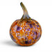 A hand-blown glass pumpkin with a rounded body featuring a marbled pattern of orange, purple, and amber tones, complete with a curved stem, shown on a white background.