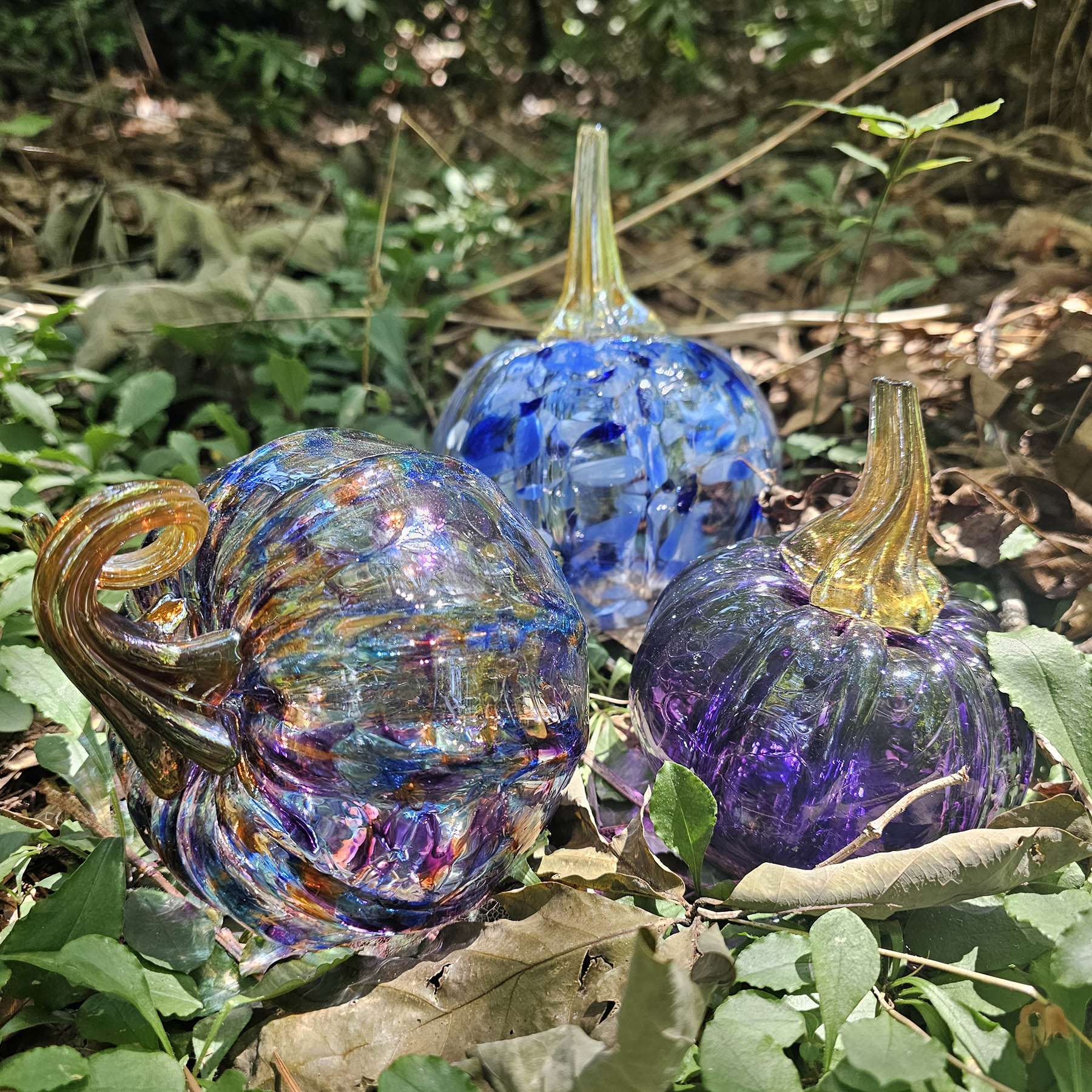 colorful handcrafted glass pumpkins are wonderful for autumn and fall home decor additions to your space