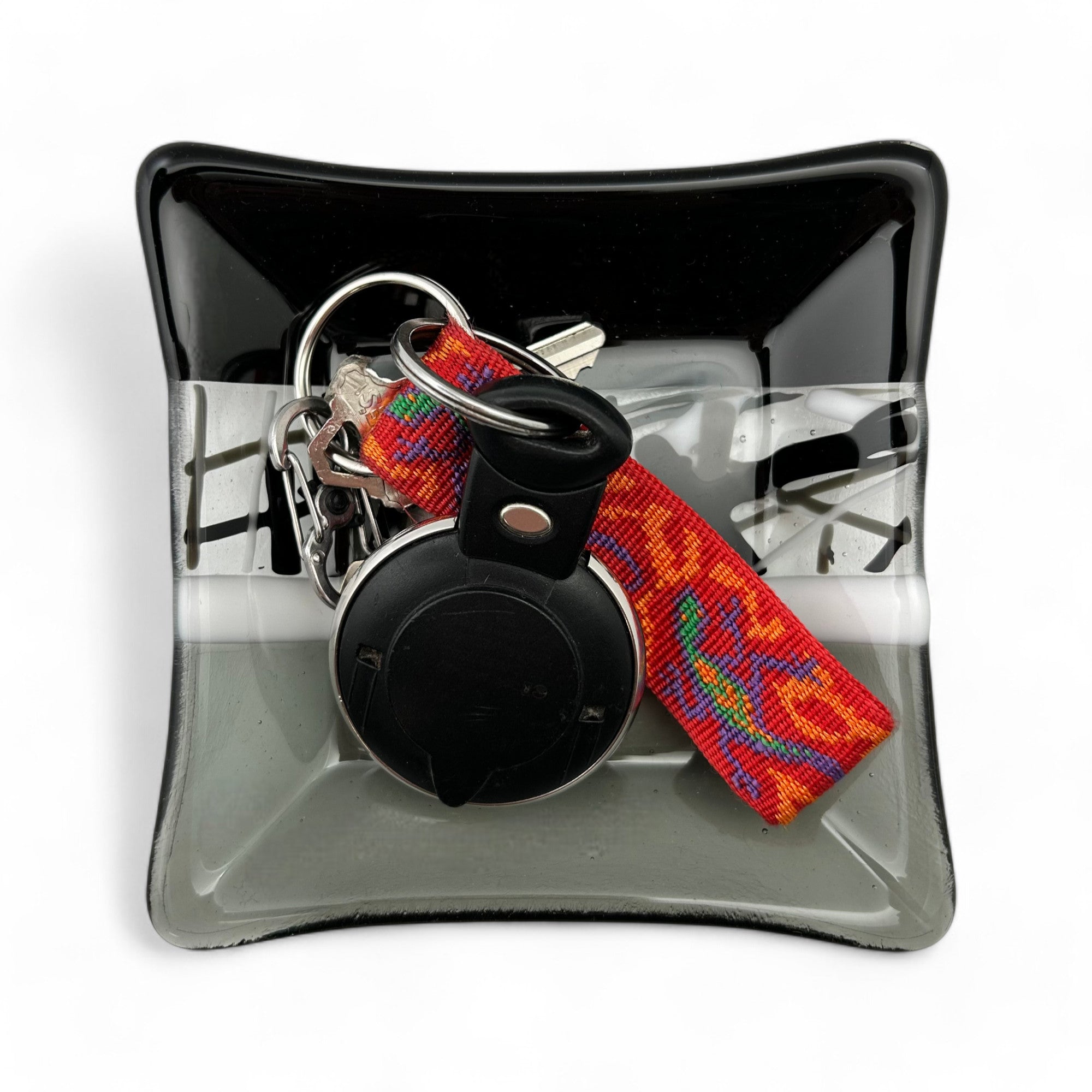 glass dish with abstract pattern is great for holding your keys