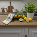 Kitchen counter with a hand-printed cotton towel gives a nice colorful air of design and decor