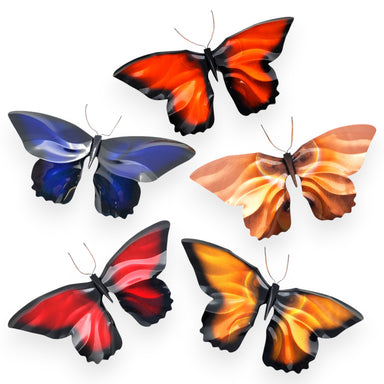 multiple colorful butterflies designed in copper to be hung on a wall