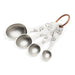 Set of pewter measuring spoons with a cherry blossom floral design 