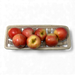 Apples in a hand-crafted rectangular ceramic basket on a white background