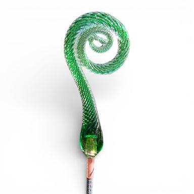 Handcrafted dark green glass fiddlehead fern for spring garden decorating