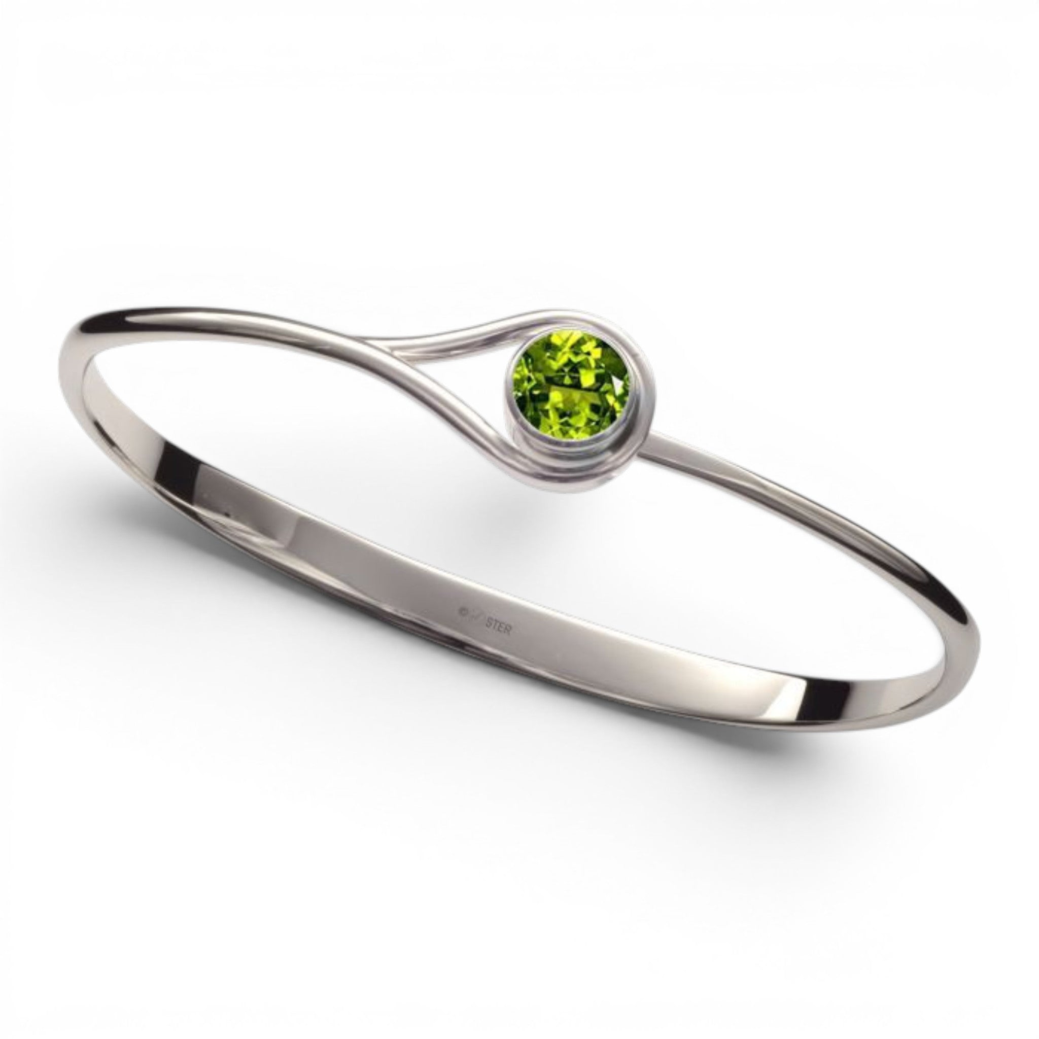 Sterling silver bracelet with a peridot green gemstone on a white background
