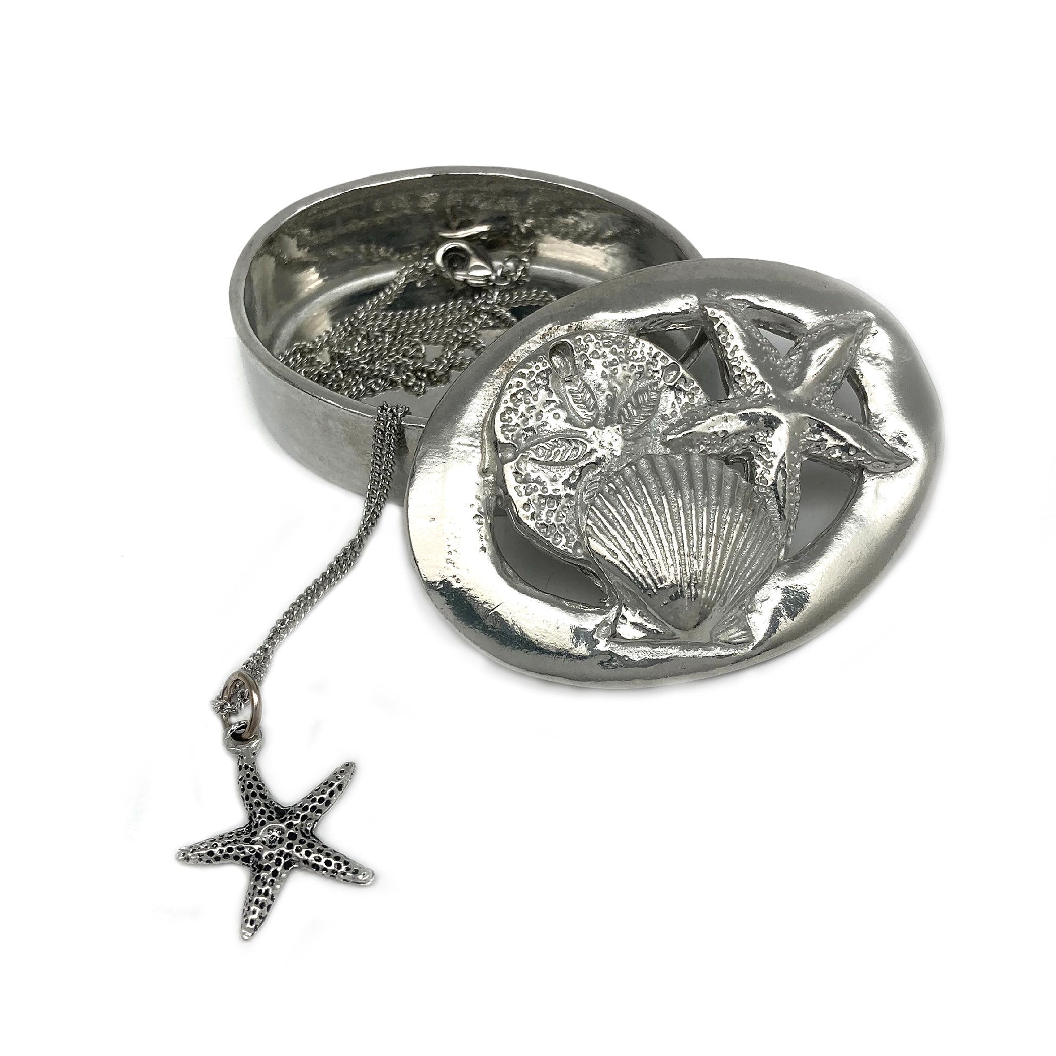 fine pewter wish box with necklace inside with sea shell design
