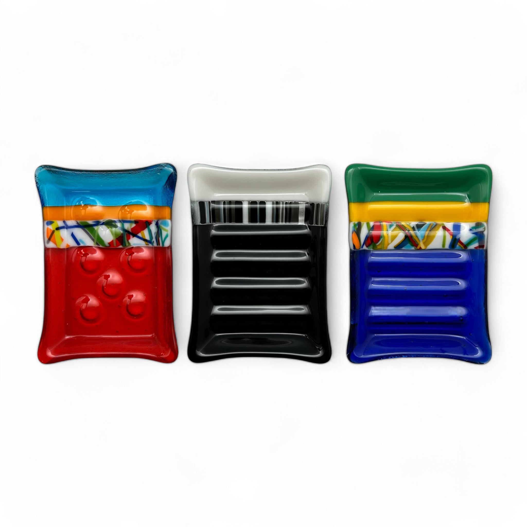 colorful glass soap dishes created by Lisa Oakley