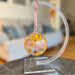 Bring in spring with a hand-blown glass ornament small or large in spring colors