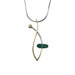 A sea glass necklace with a contemporary design, featuring a brushed sterling silver chain, a gold fill pendant, and a pearl accent.