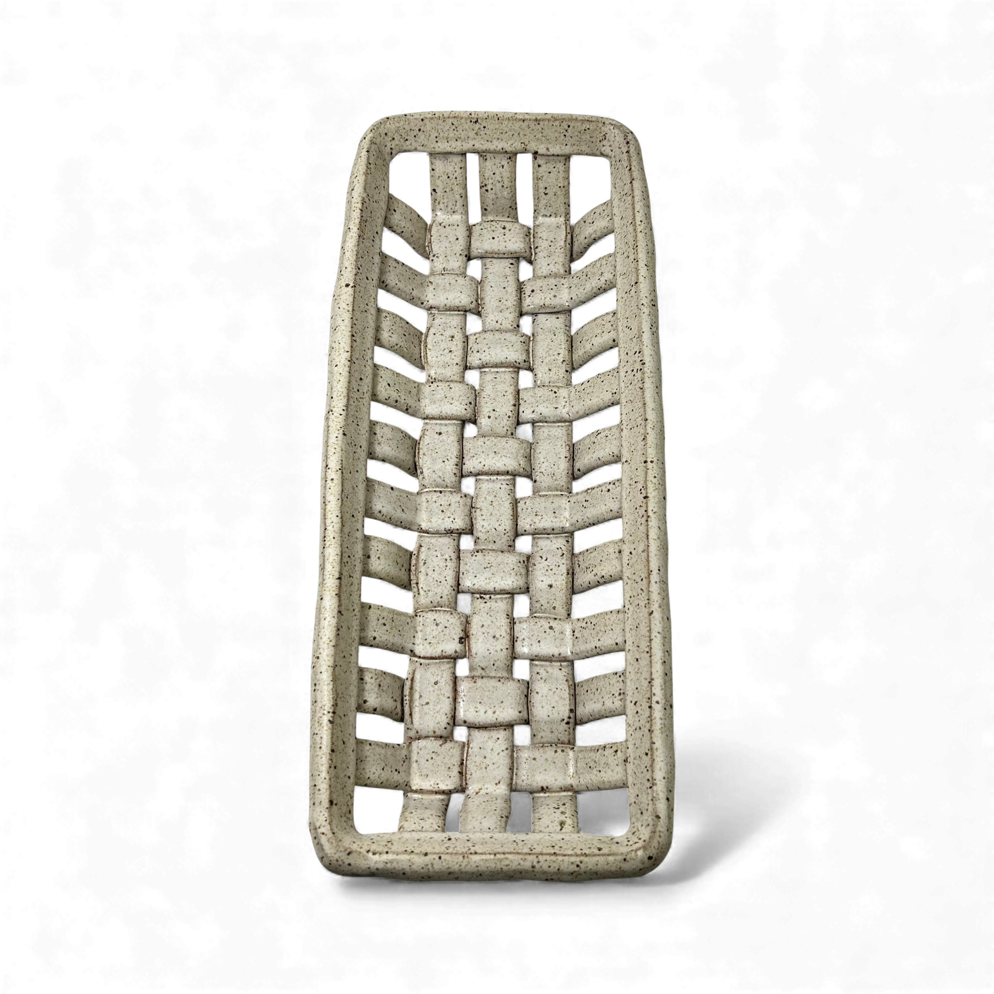 hand-woven ceramic basket vertical view