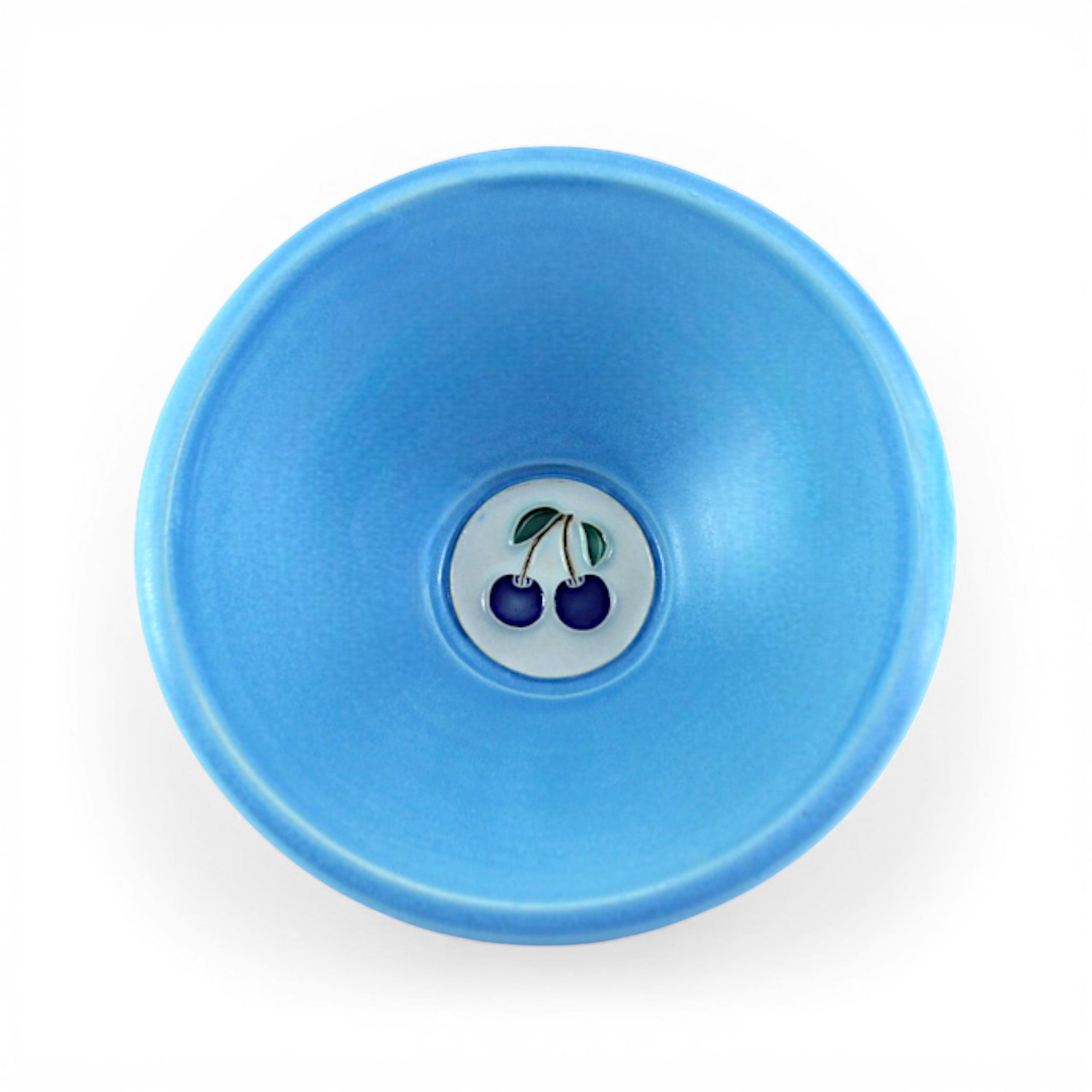 Blue ceramic bowl with a blueberry design in the center is a great way to add a cheerful vibe to your kitchen