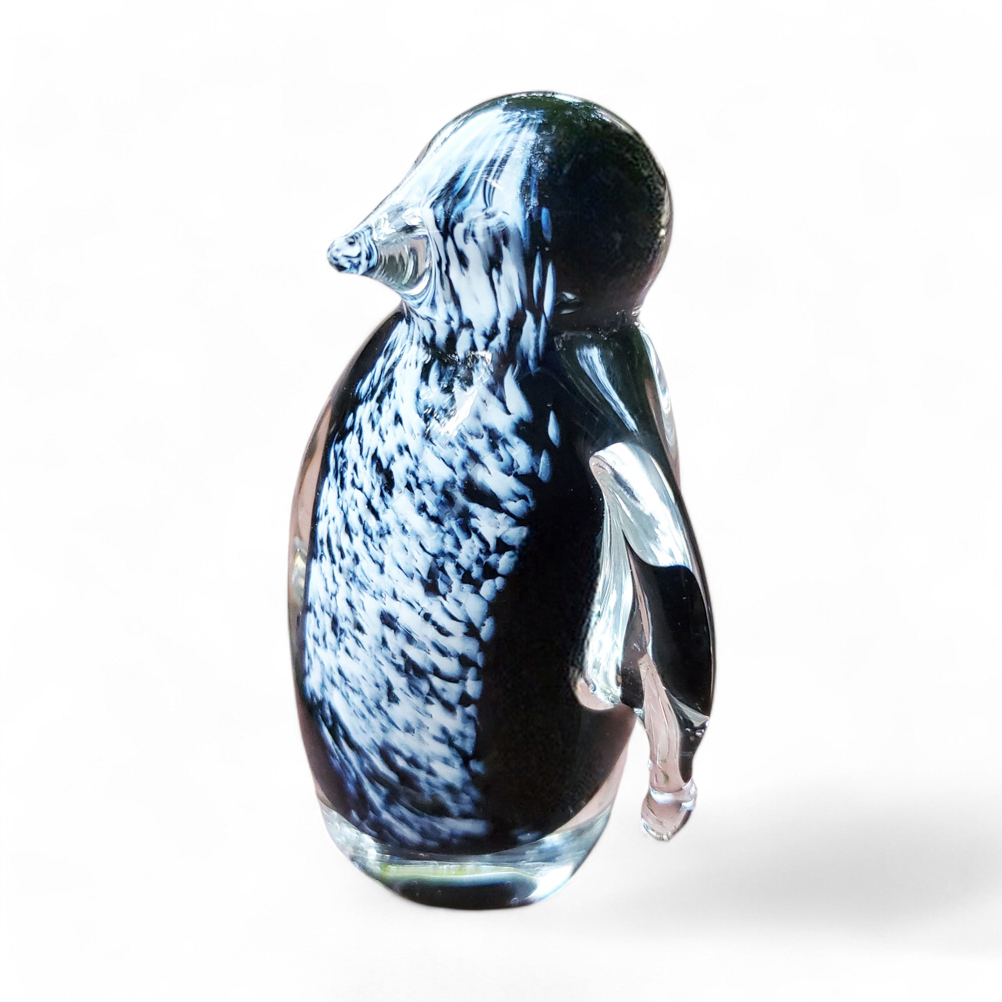 glass penguin with white speckles is great for holiday decorating