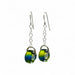 pair of handcrafted green and blue glass bead earrings with sterling silver hooks and detail
