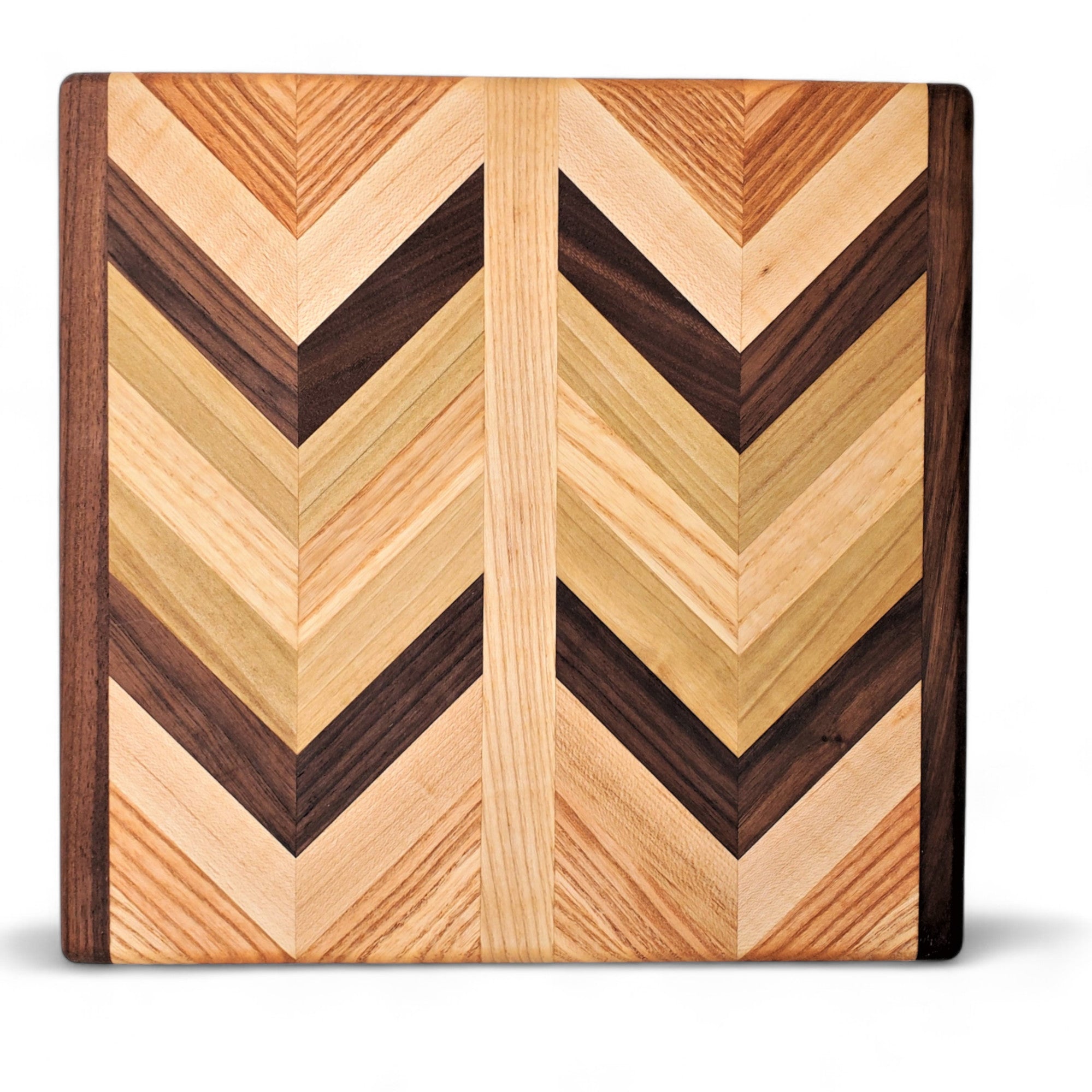 handcrafted cutting board with unique chevron pattern, made from hardwoods for years of use