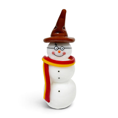 A handcrafted glass snowman figurine with a brown pointed hat, black glasses, a red and yellow scarf, and a white body. 