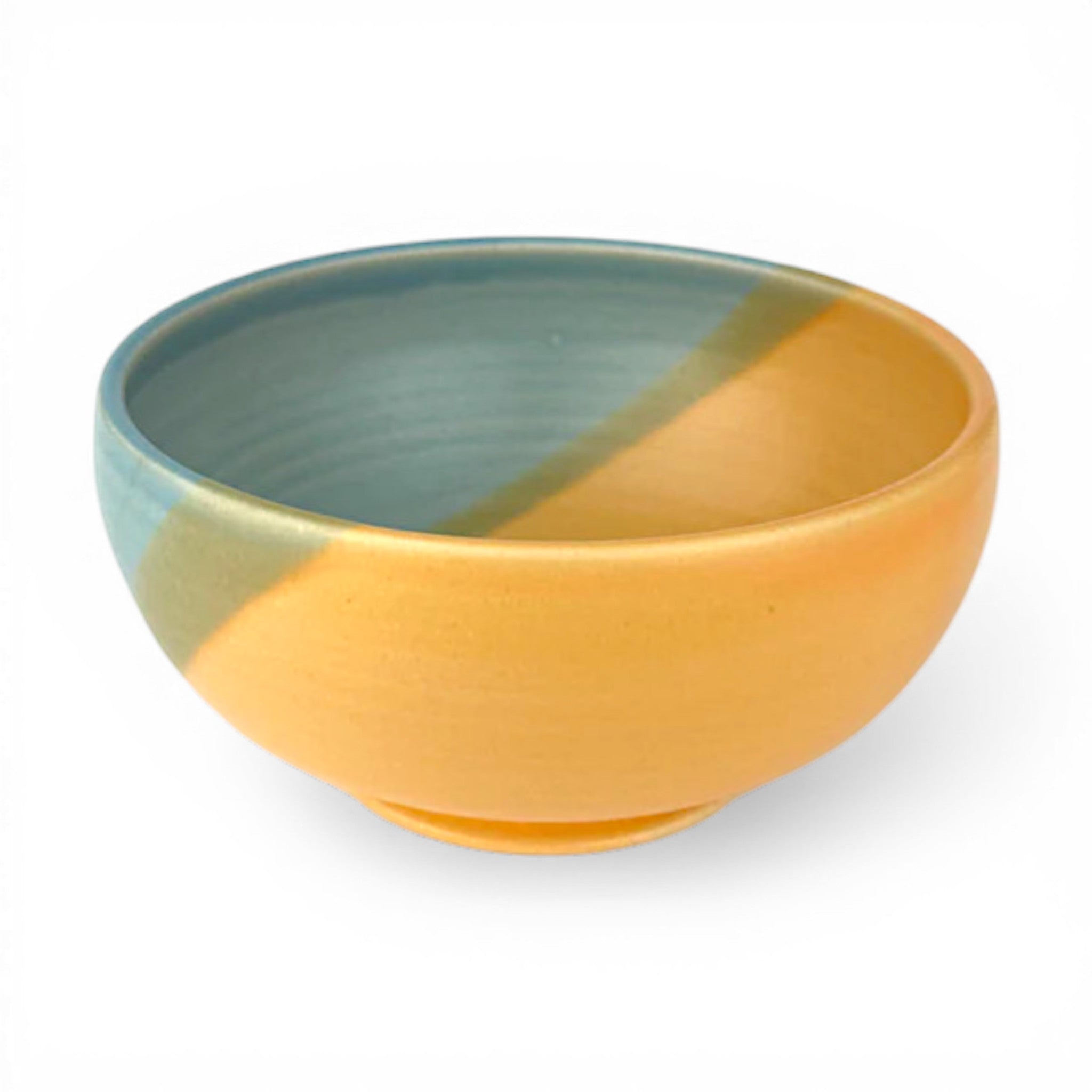 Ceramic bowl with two-tone design is great for soups, pasta, salads, or grain bowls.