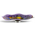 A decorative hand-blown glass reef bowl with a wavy, open top design, featuring a purple and gold pattern with small multicolored accents, incorporating a glass foot for using a a statement centerpiece on a table.