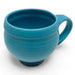 Handcrafted blue mug brings a burst of color to kitchen decor