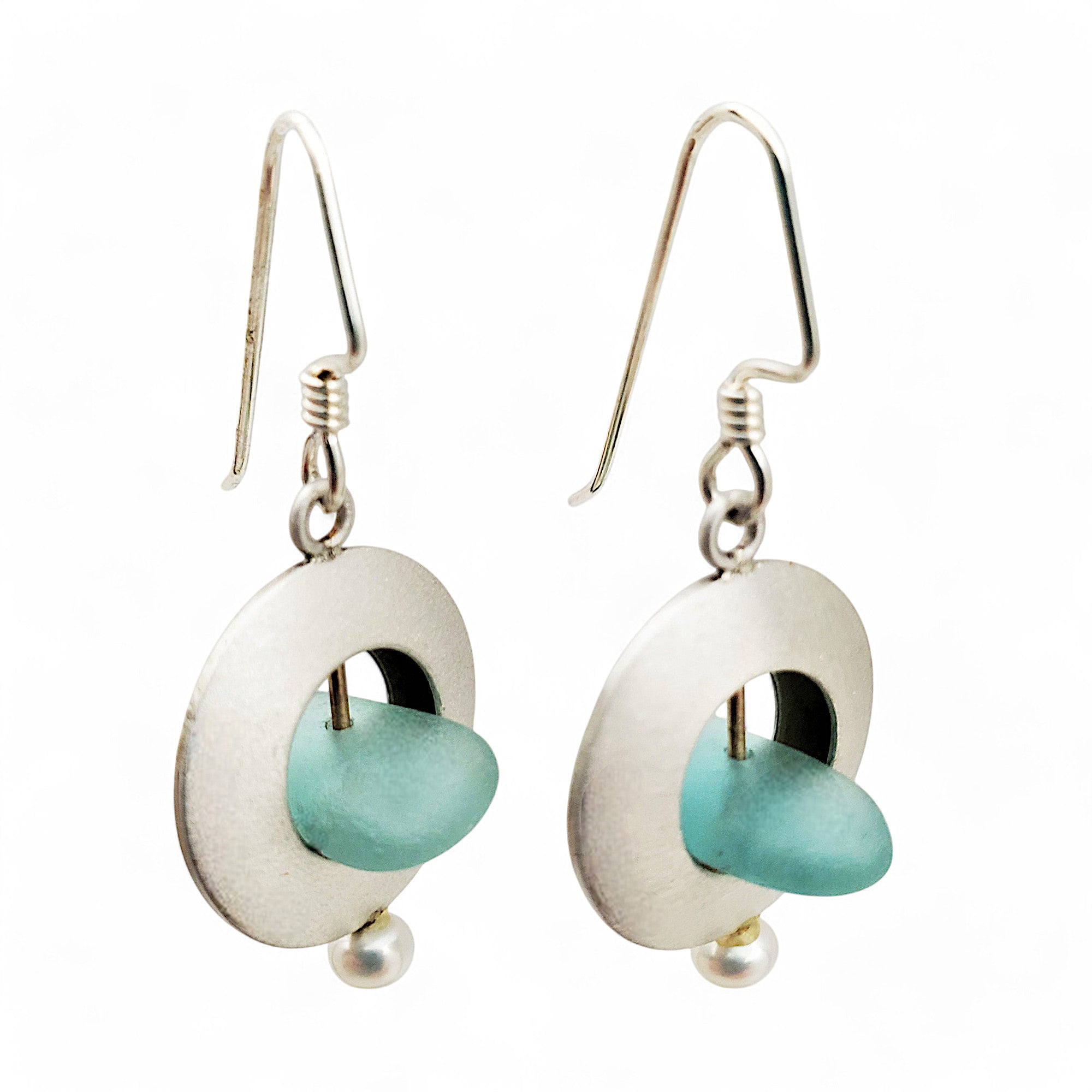 handcrafted ea glass earrings with a pearl