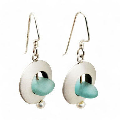 handcrafted ea glass earrings with a pearl