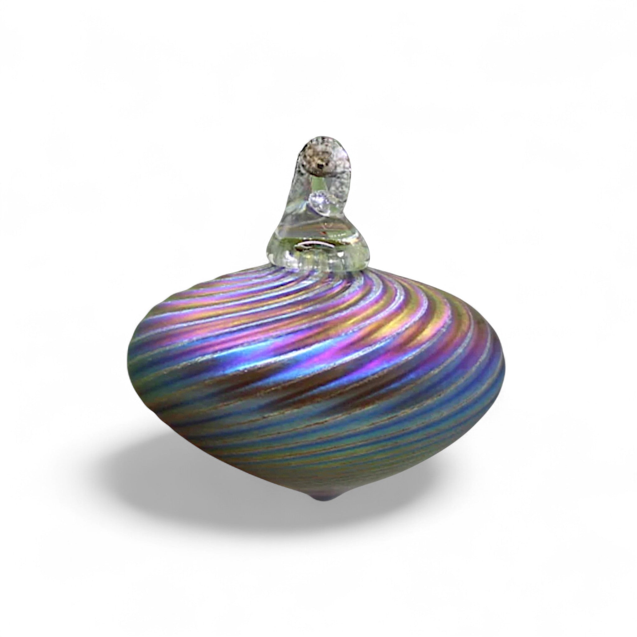 Multicolored glass ornament on a white background