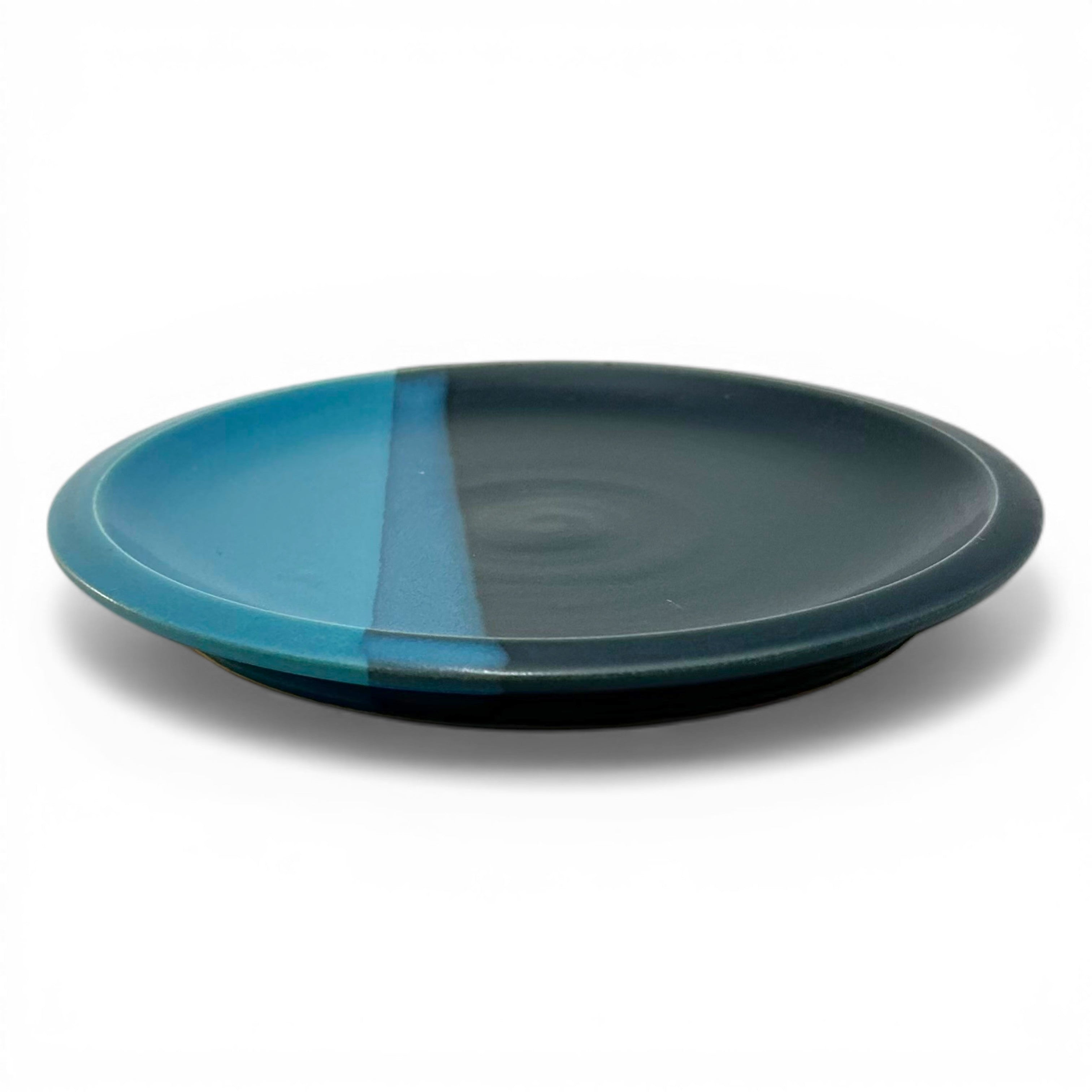 Two-toned turquoise and blue stoneware dessert plate measures seven inches in diameter