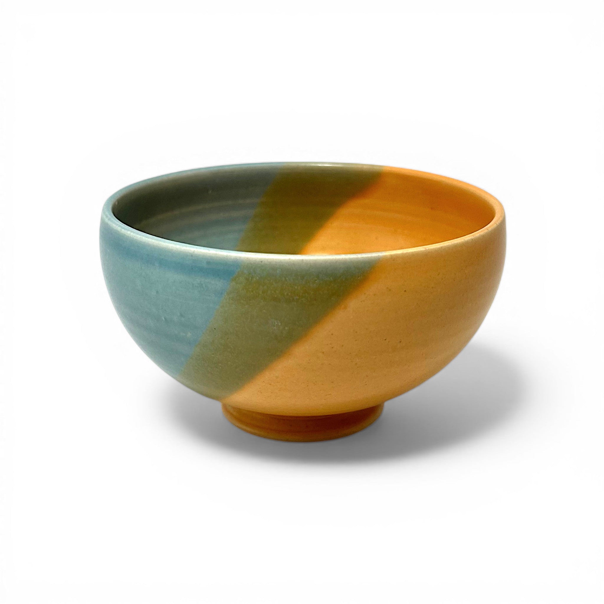 Ceramic bowl with a two-tone design on a white background