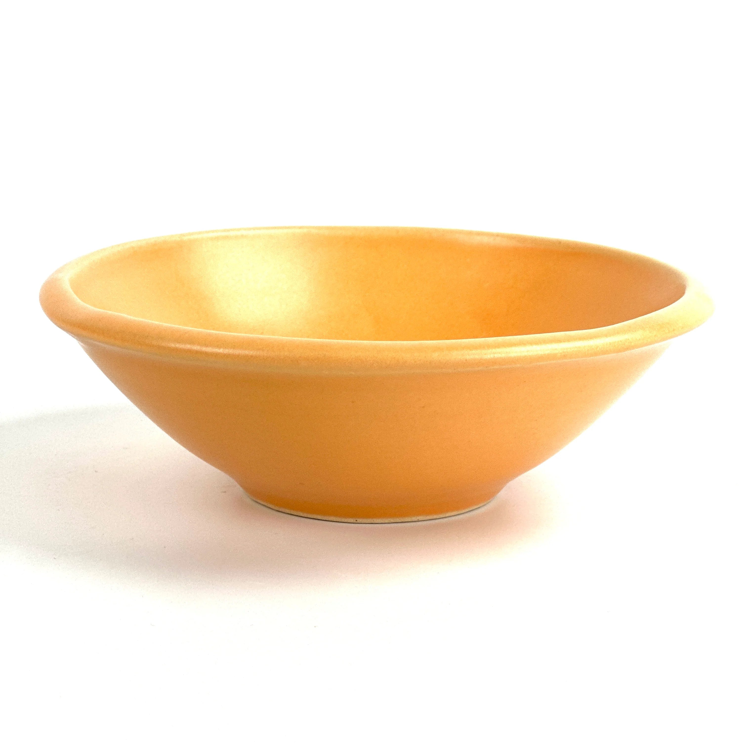 bright yellow ceramic bowl brings color to your kitchen and is a great size for cereal, salad, and soup
