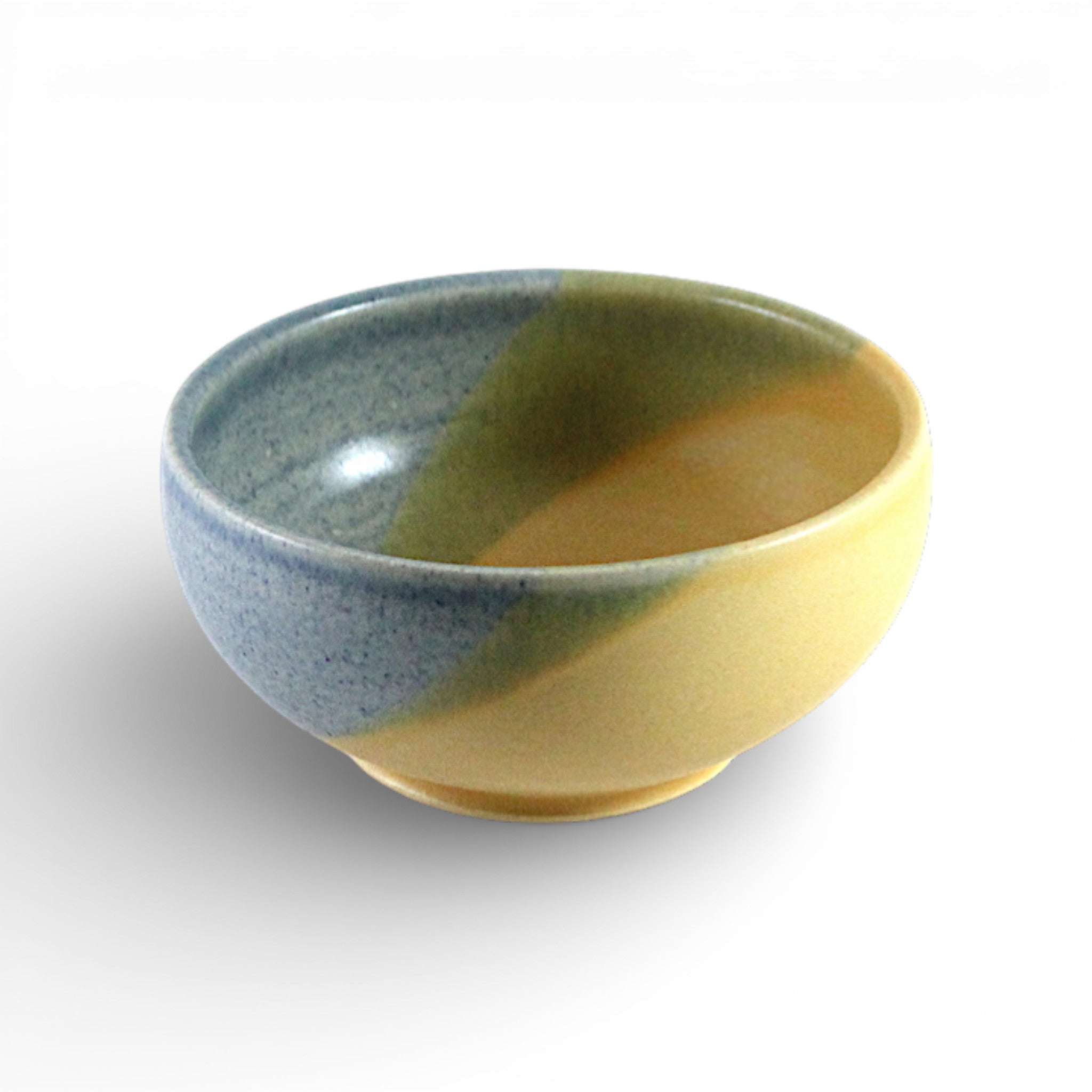 Ceramic bowl with blue and green stripes on a white background