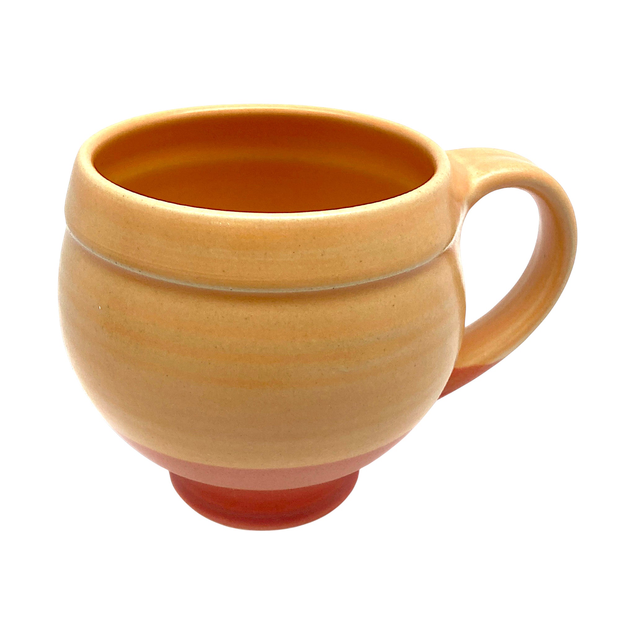 Orange ceramic mug gives kitchens a burst of color