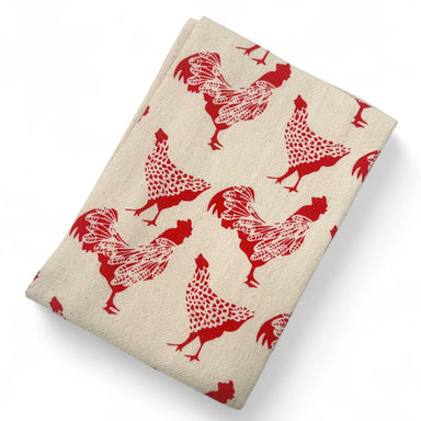 Folded 100% recycled cotton kitchen with red rooster pattern in bright red, environmentally friendly ink
