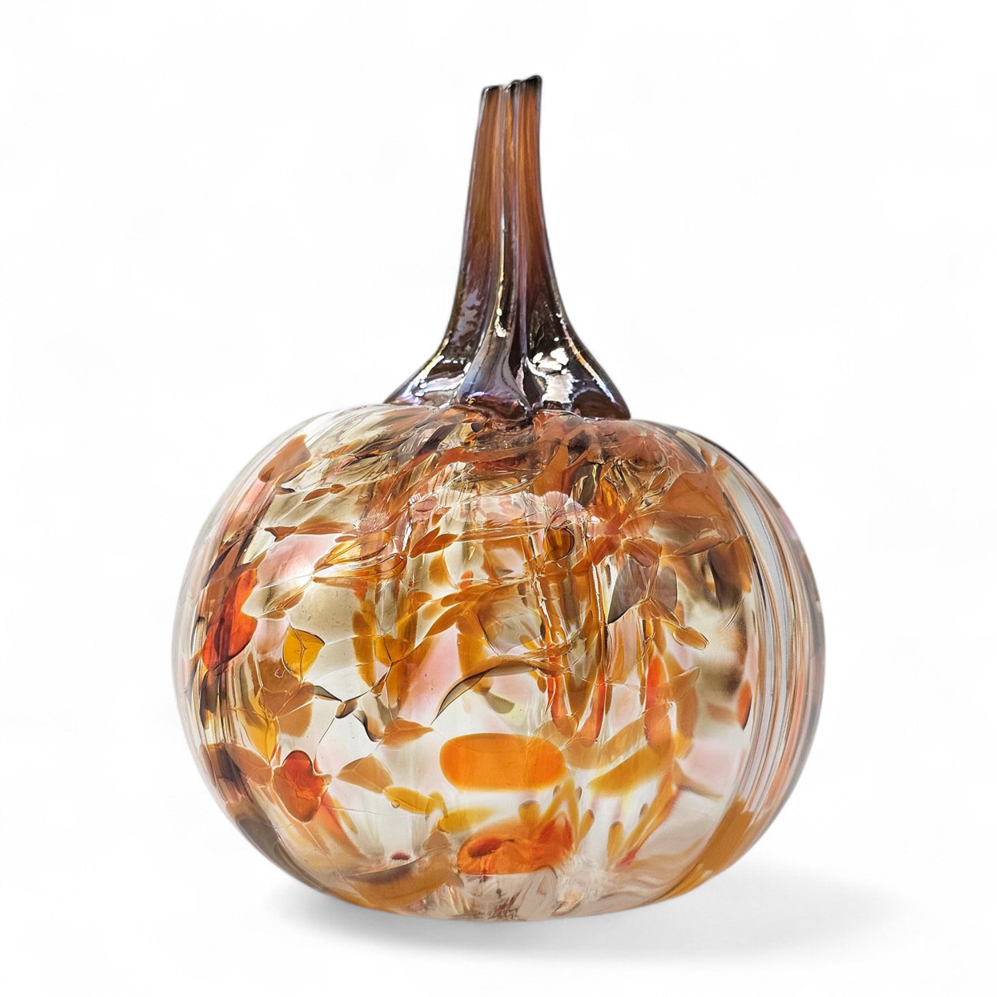 handcrafted glass pumpkin on a white background