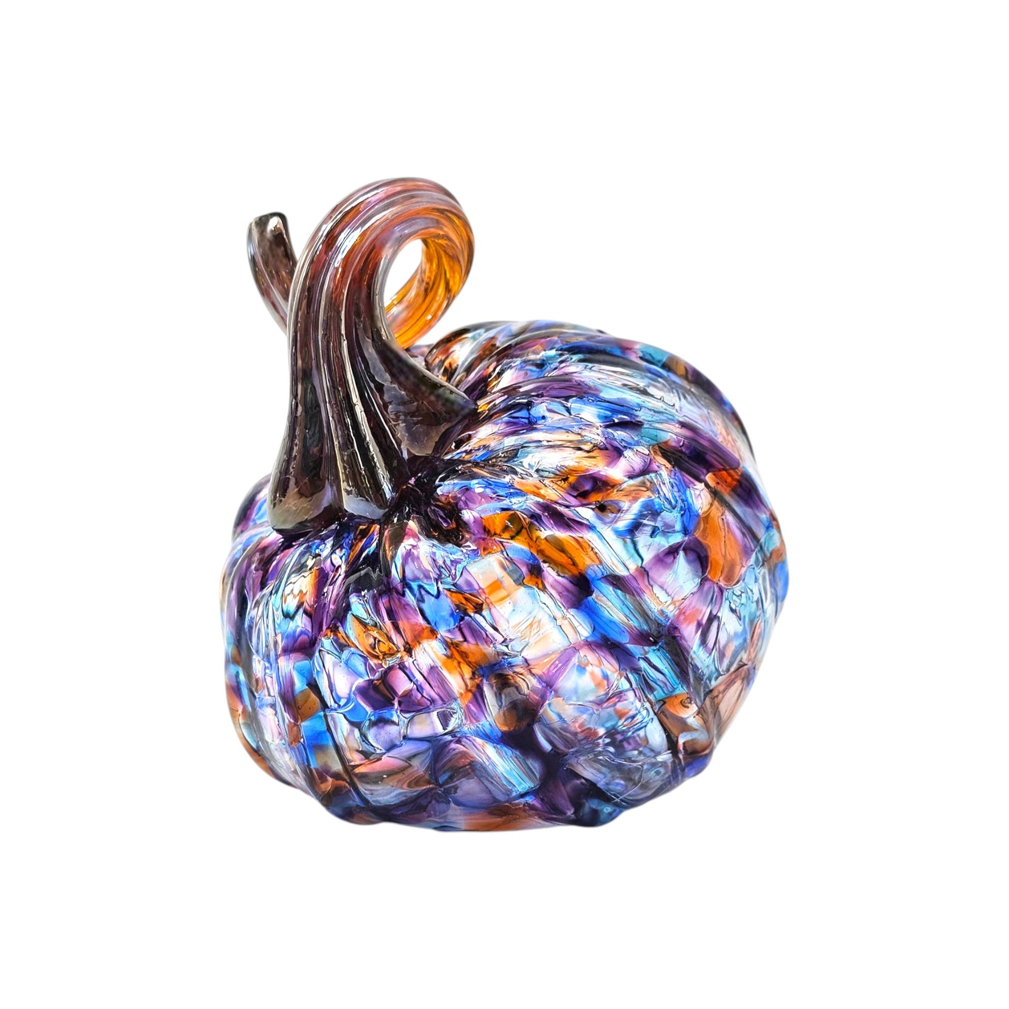 Multicolored handblown glass pumpkin on a white background