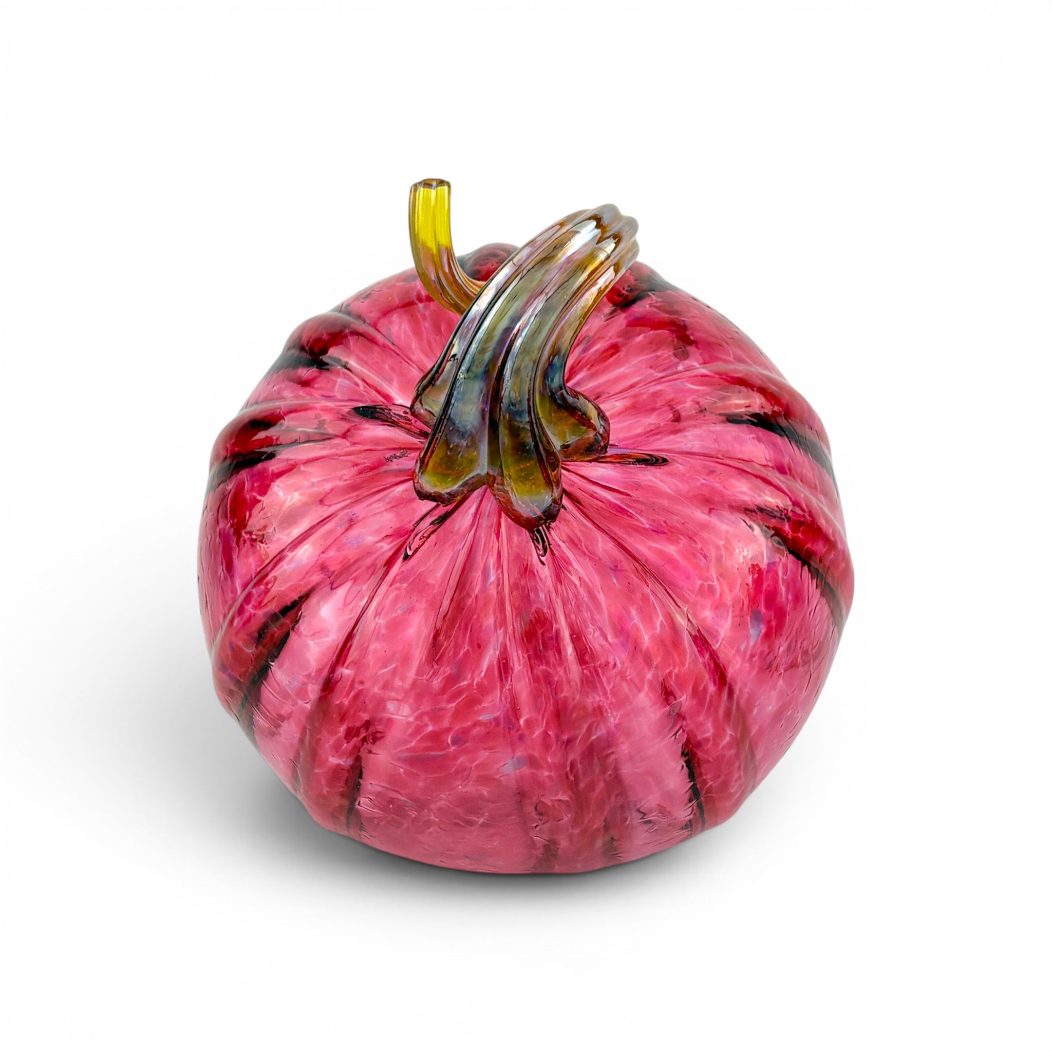 A decorative hand-blown glass pumpkin with a vibrant pink body, dark brown marbled veins, and a textured amber-brown stem, shown on a clean white background.