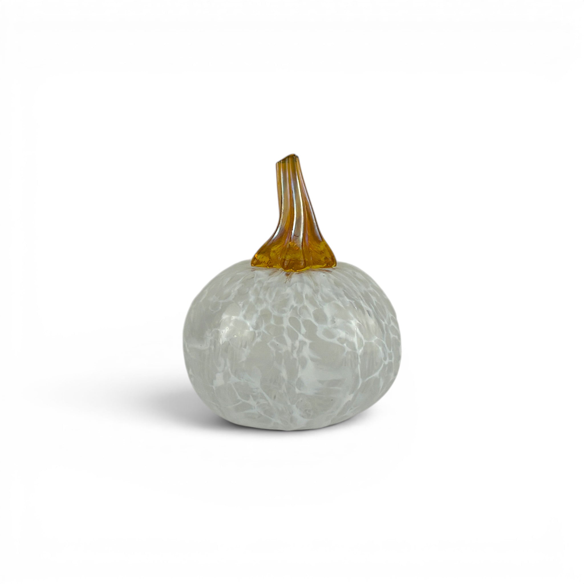 A decorative glass pumpkin with a textured, crackled pale gray body and a glossy amber-brown stem, shown on a clean white background.
