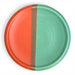 Round ceramic plate with red, brown, and green colors is a bright touch for any kitchen