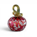 A hand-blown glass pumpkin, featuring a vibrant pink body with white and gold marbled inclusions, topped with a twisted gold stem loop. 