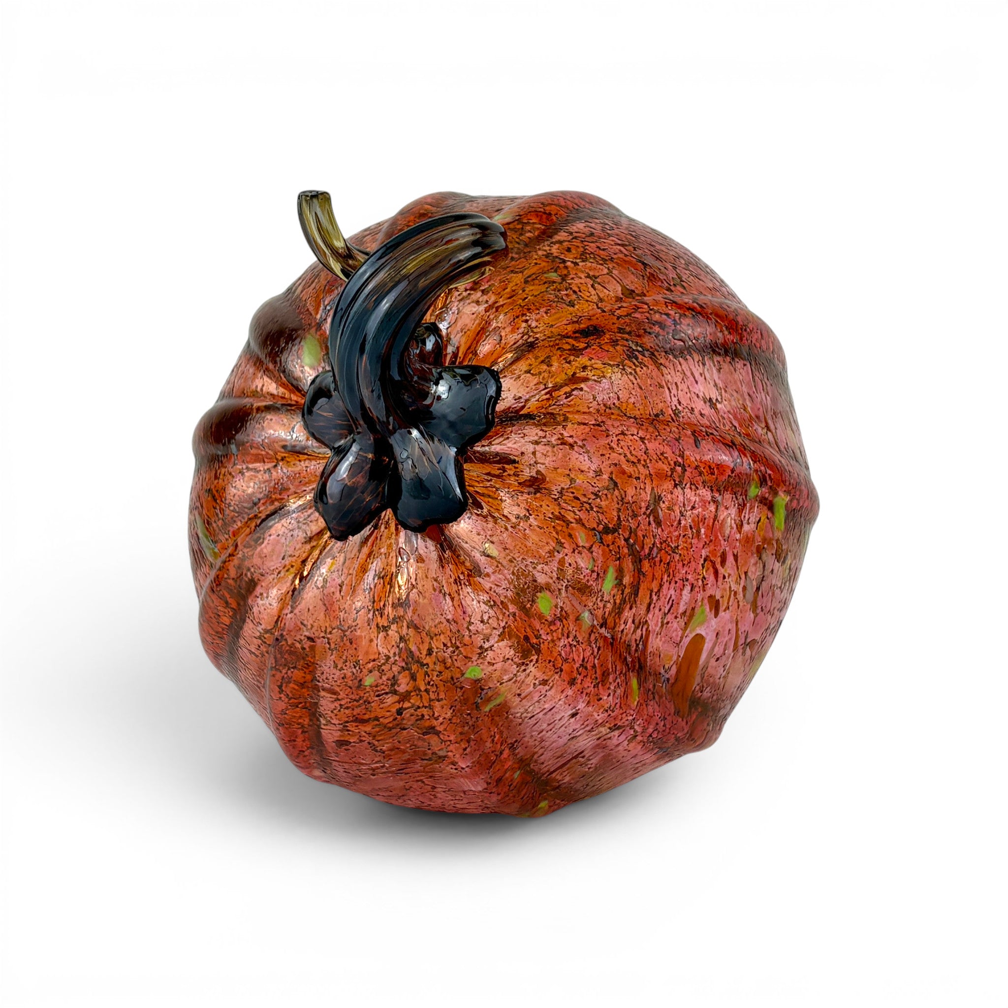 A decorative glass pumpkin with a mottled orange, red, and brown pattern, featuring a dark, glossy stem at the top, shown on a clean white background.