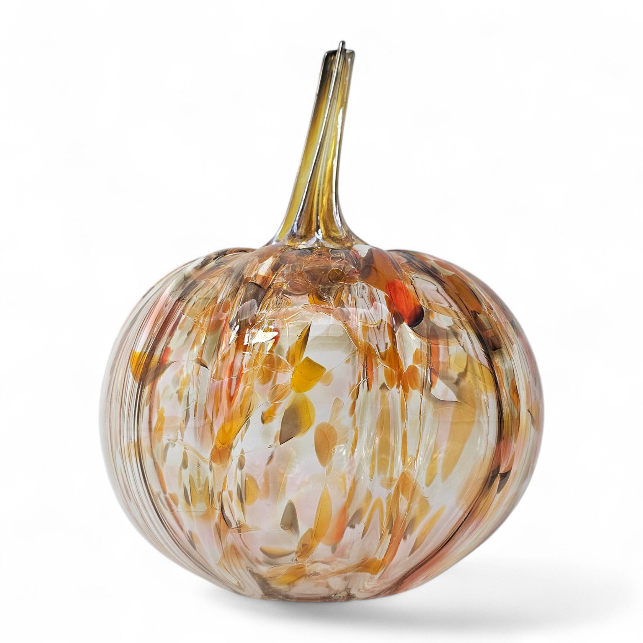 Glass pumpkin with multicolored swirls on a white background