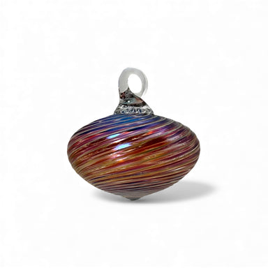 Multicolored striped glass ornament on a white background