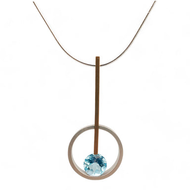 sterling silver and gold fill pendant with blue topaz on a sterling serpentine chain