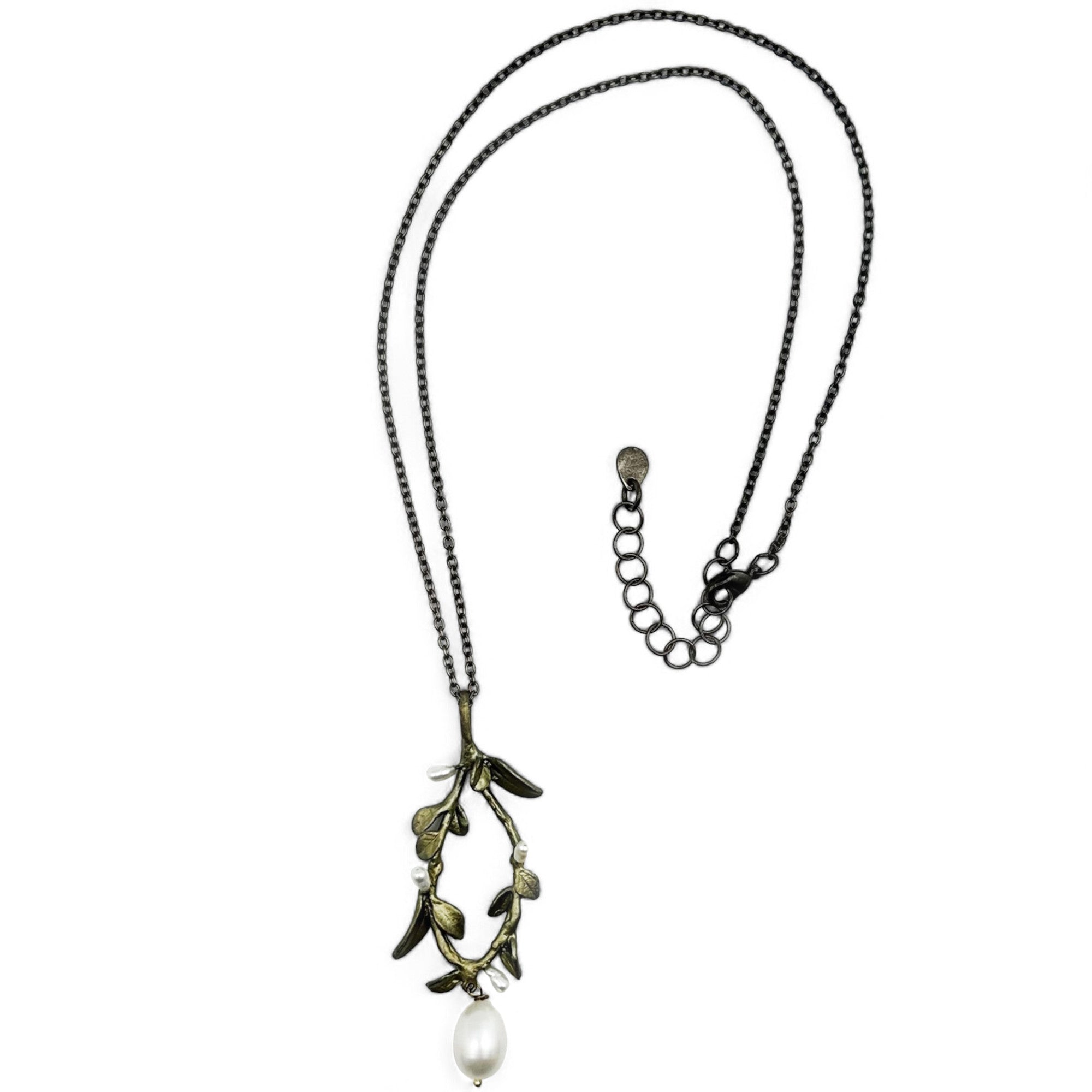 this victorian vine bronze and pearl pendant has an adjustable length