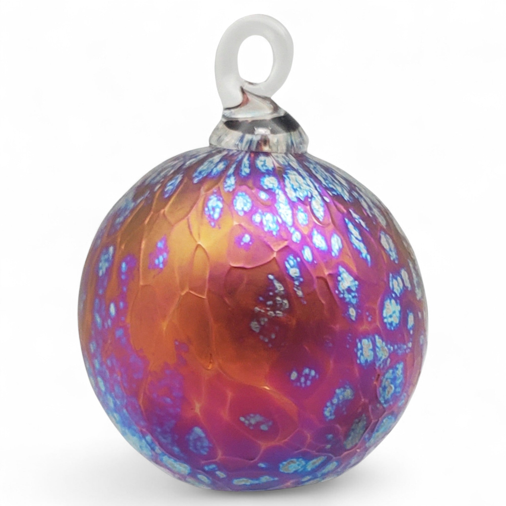 Decorative glass ornament with a multicolored pattern on a white background
