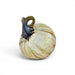 A decorative glass pumpkin with a cream and gold marbled body and a dark brown stem.