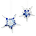 Two snowflake-shaped glass ornaments with a white and dark blue color pattern, displayed against a white background.