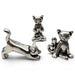 Three silver cat charms on a white background
