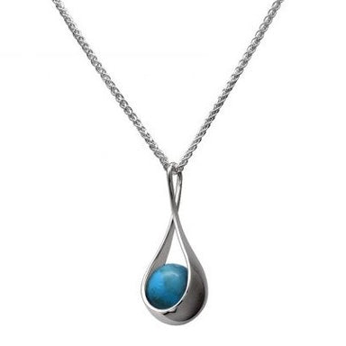 A sterling silver pendant featuring a turquoise accent stone, suspended from a silver chain.