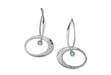 sterling silver elliptical earrings with a blue topaz gemstone