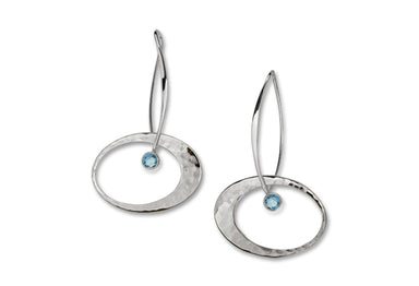 sterling silver elliptical earrings with a blue topaz gemstone