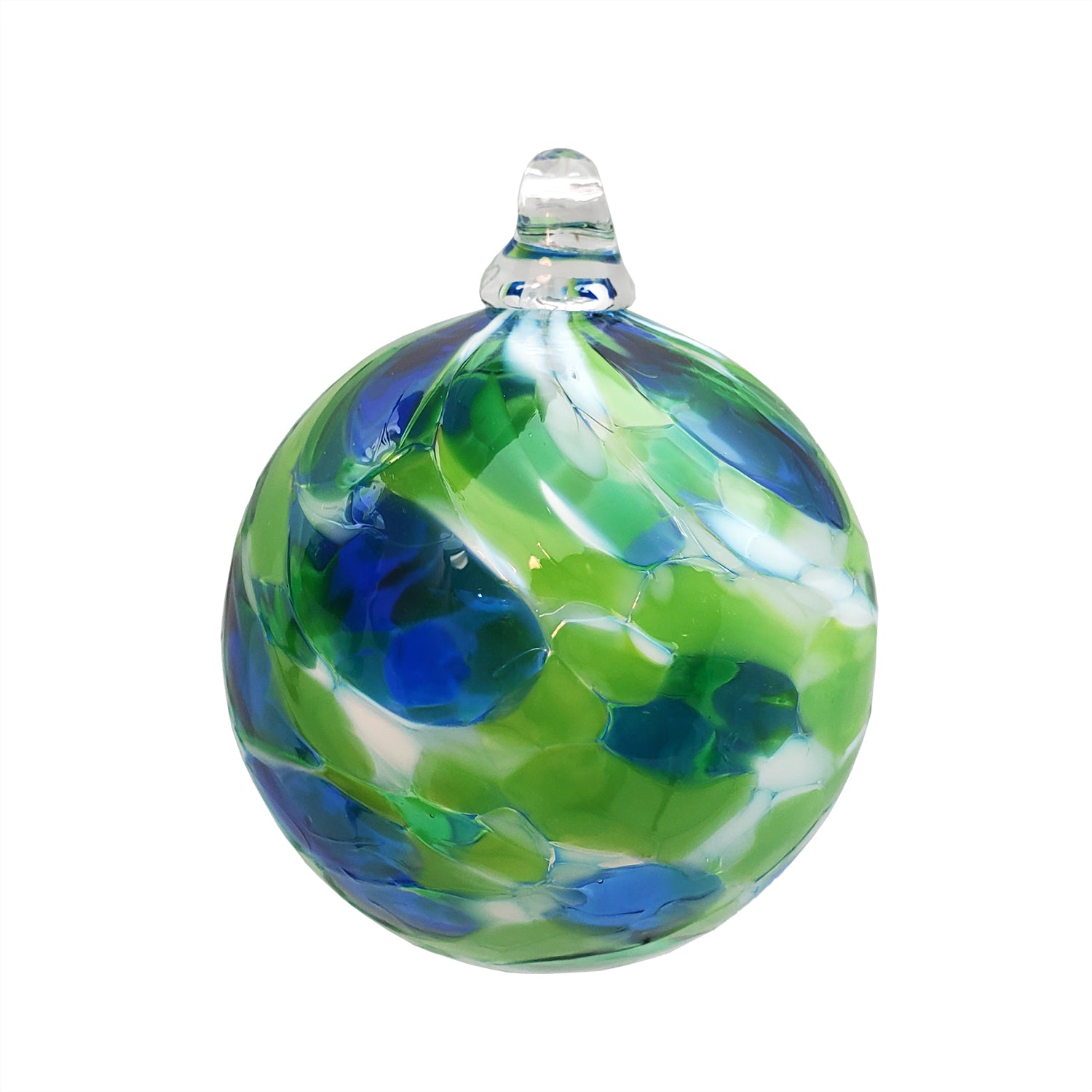 A handcrafted glass ornament with shades of green, blue, and white, featuring a solid pattern.